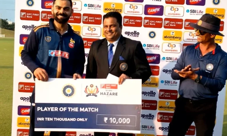Virat Kohli's classic innings leads Delhi to a thrilling win, with the 10,000 prize money a hot topic of discussion.