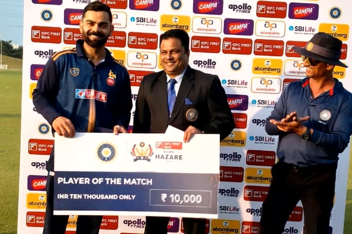 Virat Kohli's classic innings leads Delhi to a thrilling win, with the 10,000 prize money a hot topic of discussion.