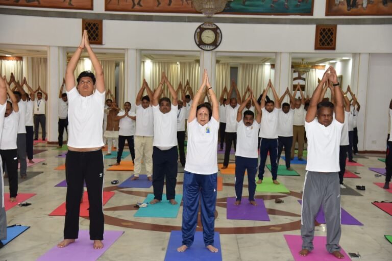 Message of Yoga resonates at Lok Bhawan; officials and employees perform yoga together.