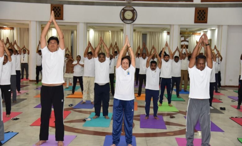 Message of Yoga resonates at Lok Bhawan; officials and employees perform yoga together.