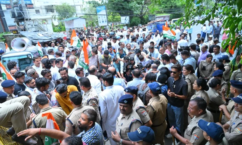 Politics heats up over land scam allegations; Congress stages major protest.
